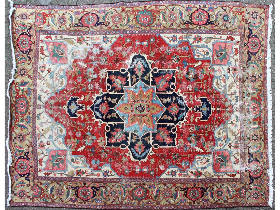 A LARGE PERSIAN CARPET with large star motif.  11ft (1 of 3)
