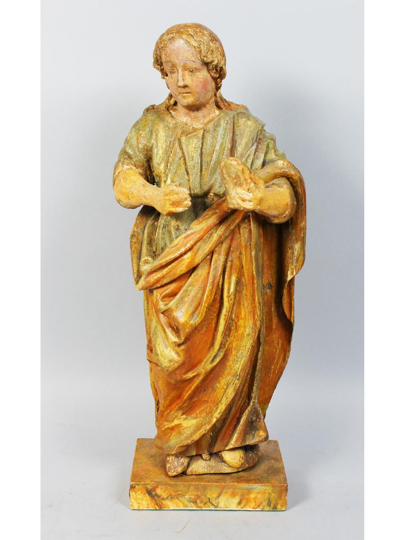 AN 18TH CENTURY ITALIAN CARVED WOOD STANDING SAINT.: AN 18TH CENTURY ITALIAN CARVED WOOD STANDING SAINT. 21ins high.