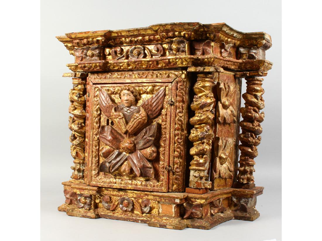 AN 18TH CENTURY ITALIAN RELIQUARY CABINET, carved with (1 of 1)