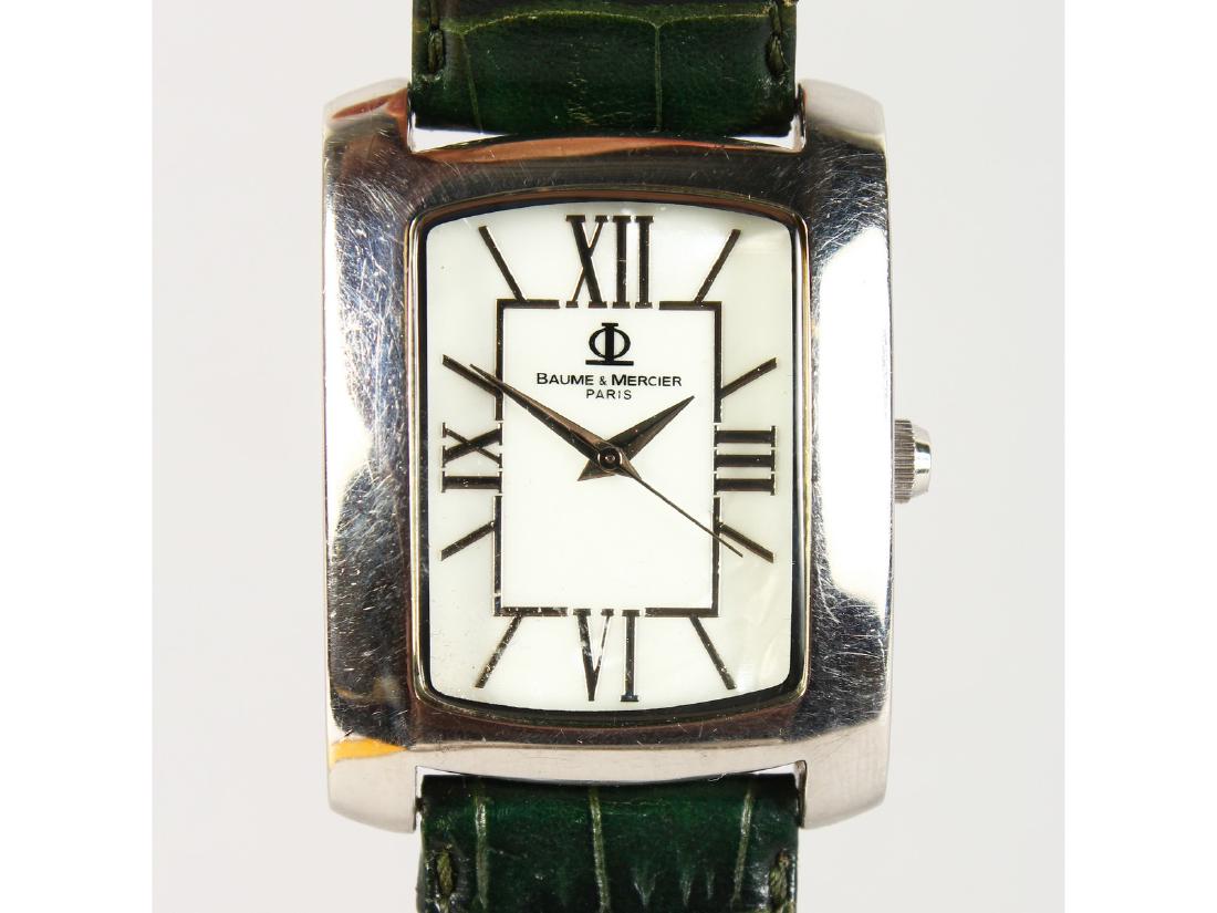 A BAUME & MERCIER WRISTWATCH with leather strap. (1 of 4)