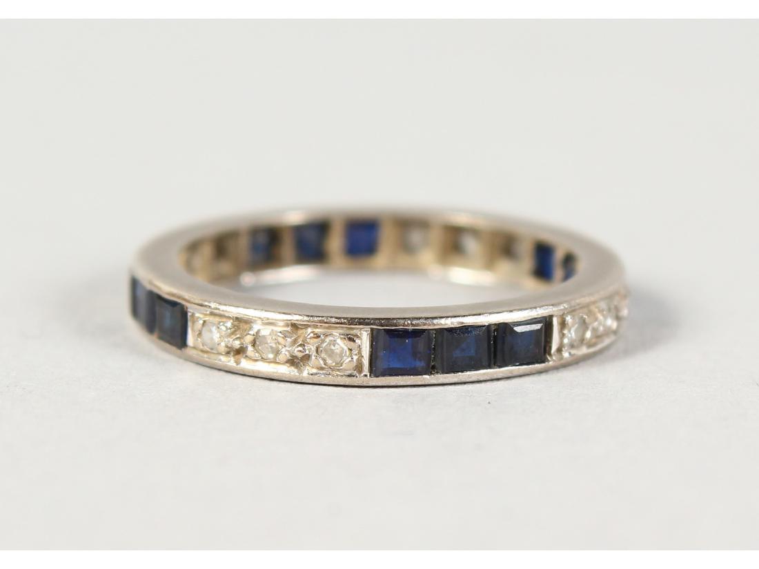 AN 18CT WHITE GOLD, SAPPHIRE AND DIAMOND ETERNITY RING. (1 of 1)
