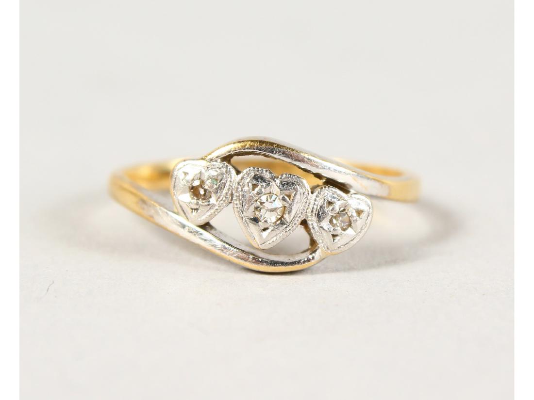 AN 18CT GOLD THREE-STONE DIAMOND RING. (1 of 1)