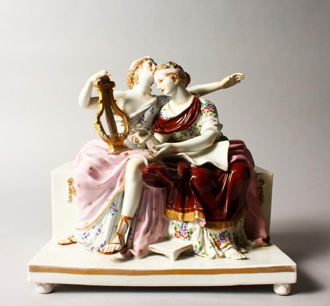 A CONTINENTAL PORCELAIN GROUP OF TWO CLASSICAL YOUNG: A CONTINENTAL PORCELAIN GROUP OF TWO CLASSICAL YOUNG LADIES, one holding a lyre and sitting on a marble bench. 9ins long. (AF).
