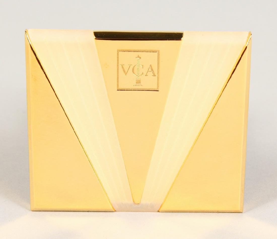 A VAN CLEEF & ARPELS MIRROR, in a velvet pouch.: A VAN CLEEF & ARPELS MIRROR, in a velvet pouch.