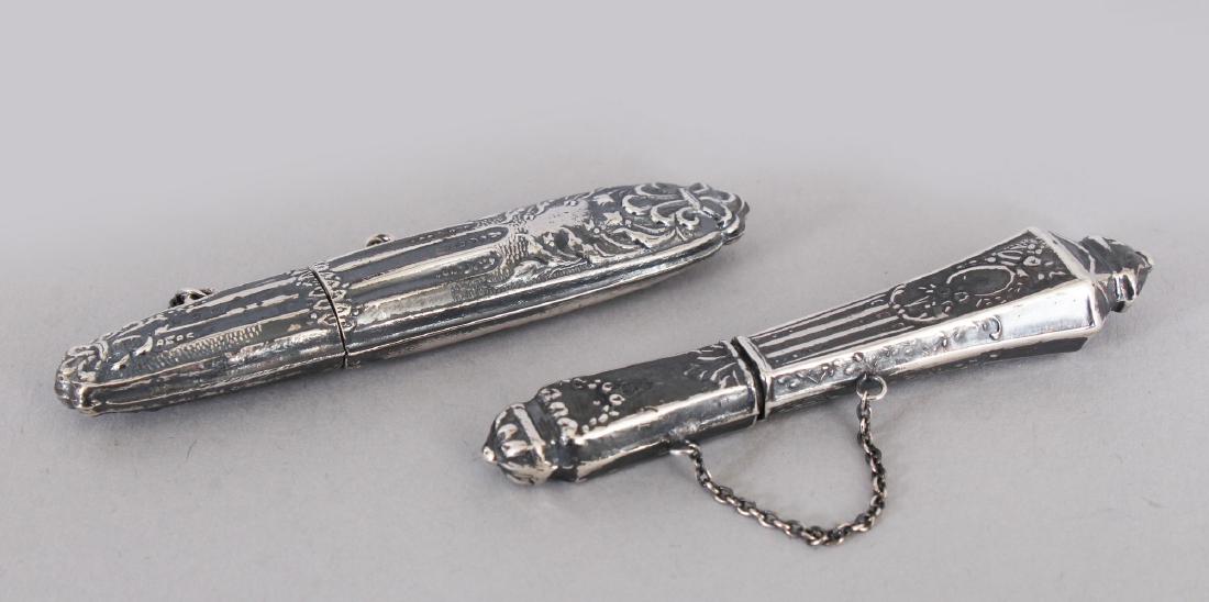 TWO SILVER NEEDLE CASES.: TWO SILVER NEEDLE CASES.
