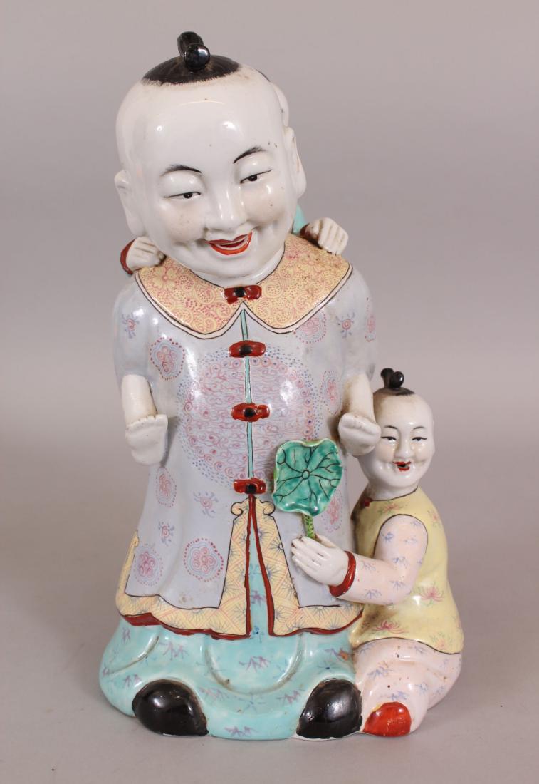 A 20TH CENTURY CHINESE PORCELAIN FIGURE OF A STANDING (1 of 6)