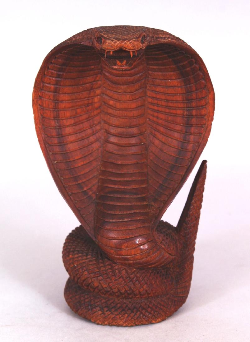 AN UNUSUAL 20TH CENTURY INDIAN WOOD CARVING OF A COBRA, (1 of 6)