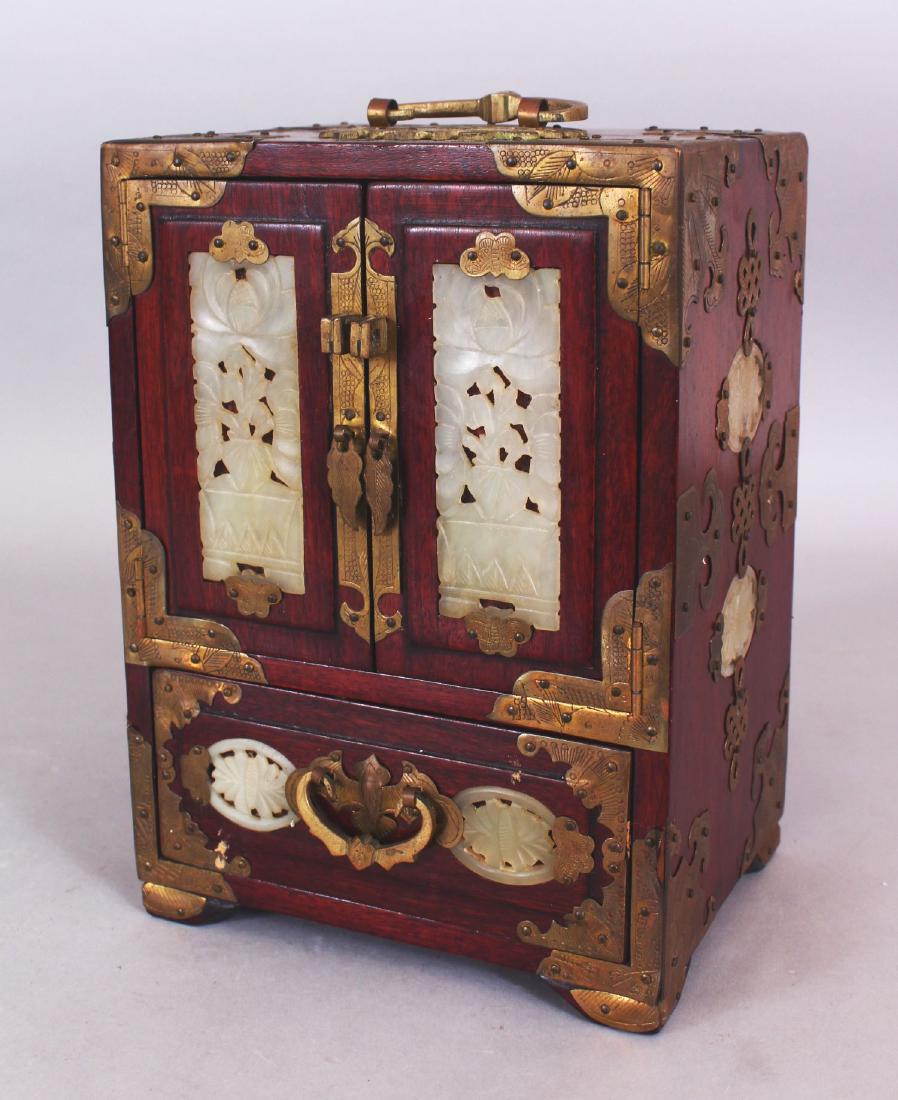 AN EARLY 20TH CENTURY CHINESE WOOD TABLE CABINET, with (1 of 8)