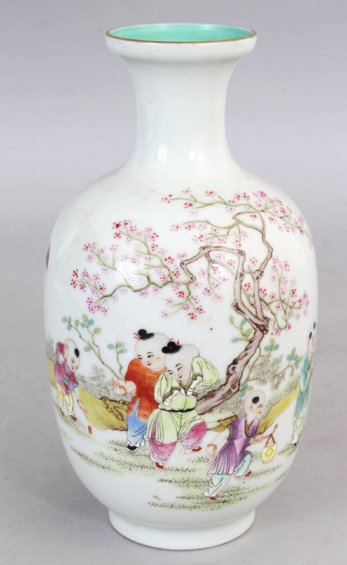 A CHINESE FAMILLE ROSE PORCELAIN VASE, decorated with a (1 of 7)