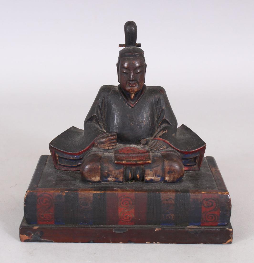 A SIMILAR JAPANESE LACQUERED WOOD MODEL OF A SAMURAI, ,: A SIMILAR JAPANESE LACQUERED WOOD MODEL OF A SAMURAI, , seated in meditation on a rectangular plinth, 5.6in x 3.3in x 5.6in high.