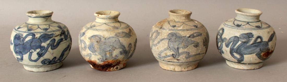 A GROUP OF FOUR SIMILAR CHINESE WANLI PERIOD SHIPWRECK: A GROUP OF FOUR SIMILAR CHINESE WANLI PERIOD SHIPWRECK BLUE & WHITE PORCELAIN JARS. (4)