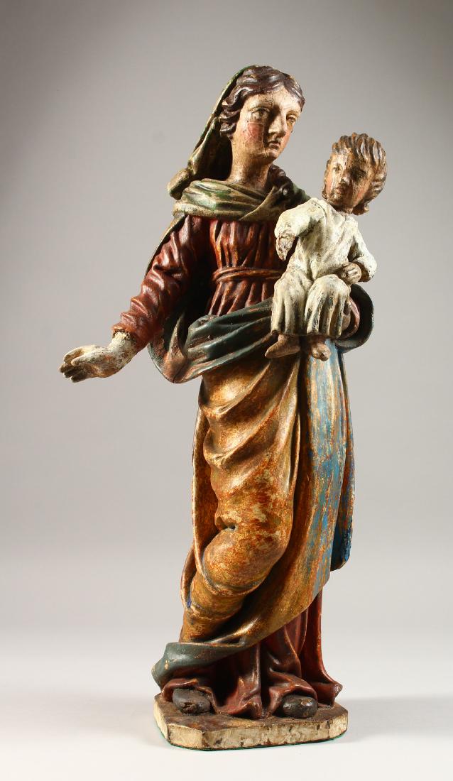 AN 18TH CENTURY ITALIAN CARVED WOOD AND PAINTED MADONNA: AN 18TH CENTURY ITALIAN CARVED WOOD AND PAINTED MADONNA AND CHILD. 1ft 10ins high.