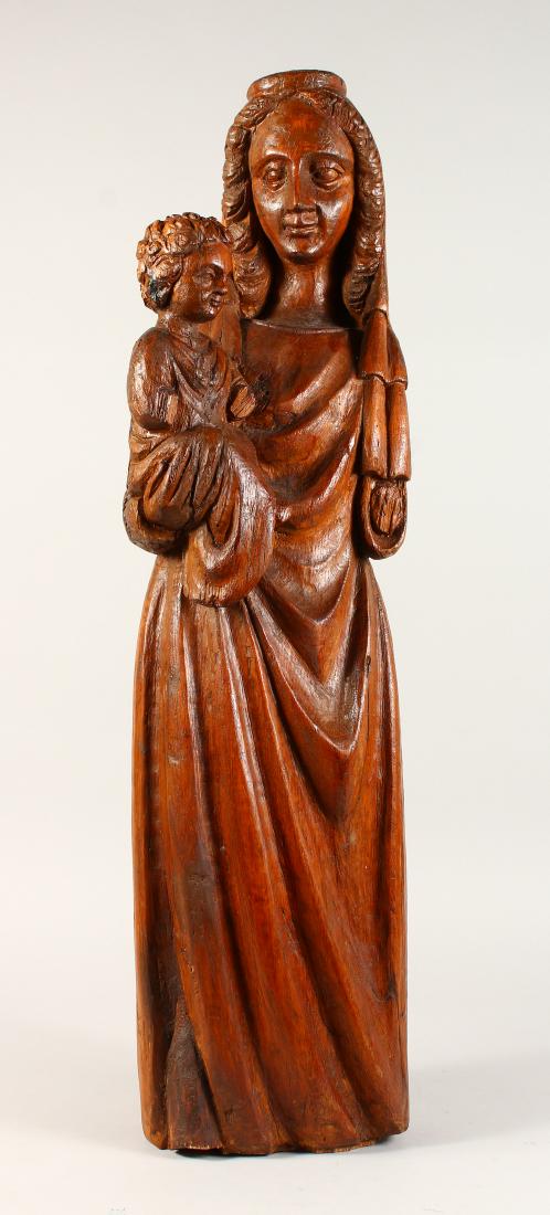 A 17TH-18TH CENTURY DUTCH CARVED WOOD MADONNA AND: A 17TH-18TH CENTURY DUTCH CARVED WOOD MADONNA AND CHILD. 2ft 9ins high.