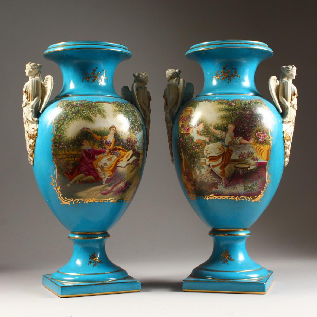 A PAIR OF SEVRES DESIGN BLUE TAPERING TWO HANDLED (1 of 1)