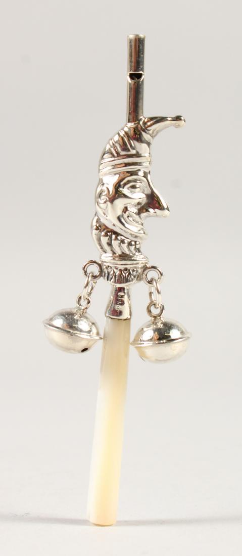 A SILVER MR PUNCH RATTLE. 4.ins long.: A SILVER MR PUNCH RATTLE. 4.ins long.