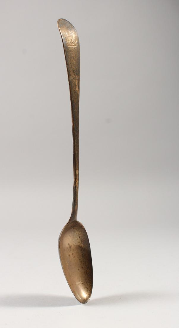 A GEORGE III TABLESPOON, London 1775. Maker SA. 11ins: A GEORGE III TABLESPOON, London 1775. Maker SA. 11ins long.