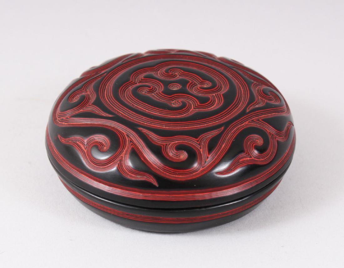 AN UNUSUAL JAPANESE MEIJI PERIOD CARVED LACQUER KOGO,: AN UNUSUAL JAPANESE MEIJI PERIOD CARVED LACQUER KOGO, signed to the base in a four-character signature within a red seal, 7.5cm diameter