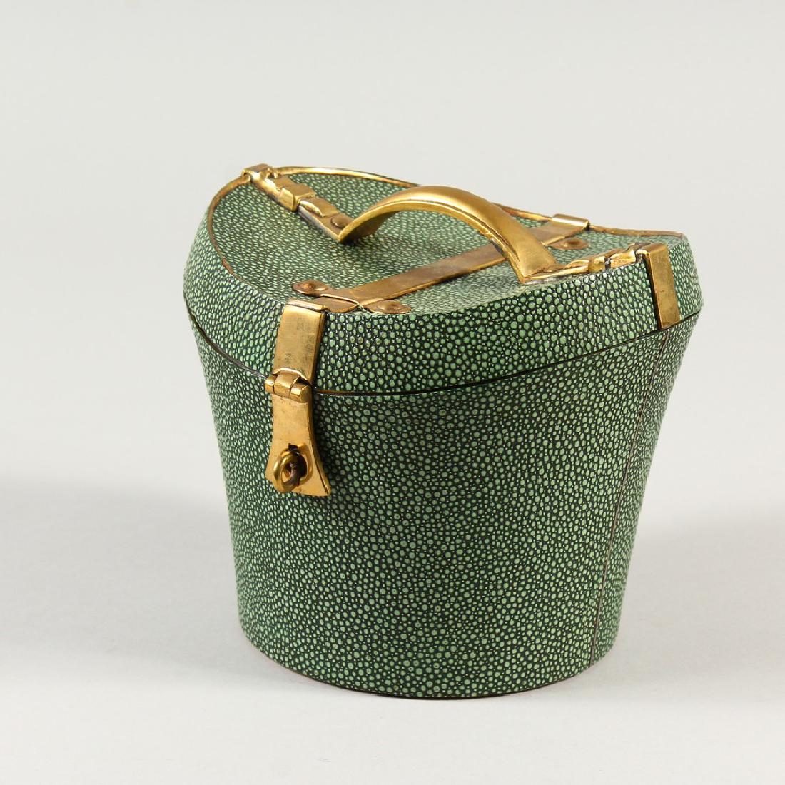 A SHAGREEN HAT BOX, with brass mounts. 14cms high.: A SHAGREEN HAT BOX, with brass mounts. 14cms high.