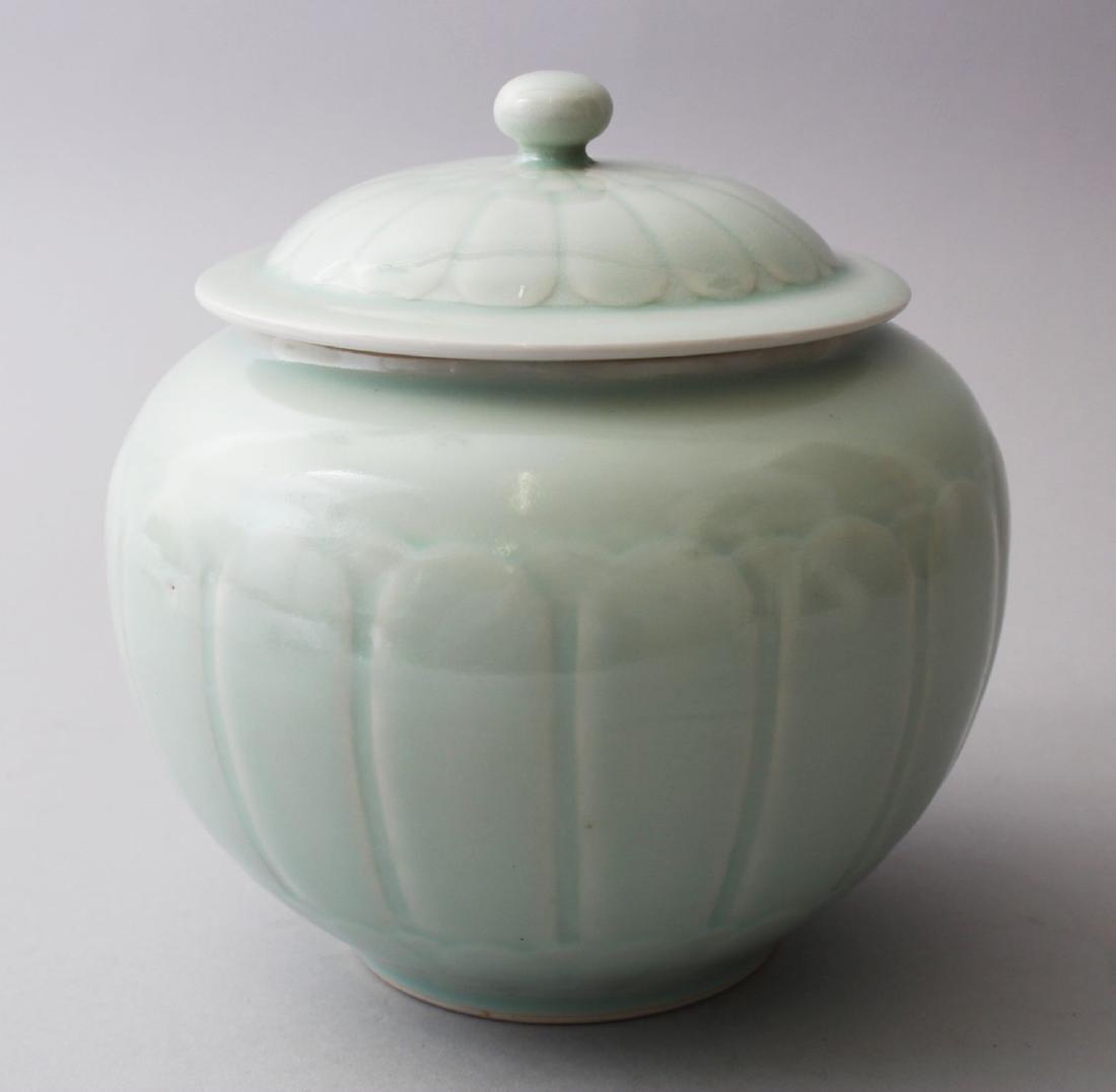 A CHINESE CELADON LONGQUAN PORCELAIN JAR AND COVER, (1 of 3)