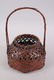 A FINE JAPANESE MEIJI PERIOD WOVEN BAMBOO IKEBANA