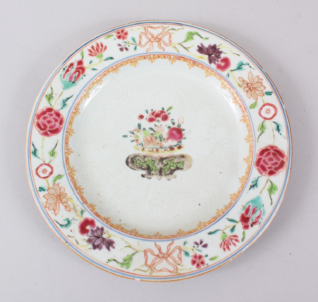 AN 18TH CENTURY CHINESE FAMILLE ROSE PORCELAIN PLATE,: AN 18TH CENTURY CHINESE FAMILLE ROSE PORCELAIN PLATE, decorated with arrays of flora, 22cm diameter.
