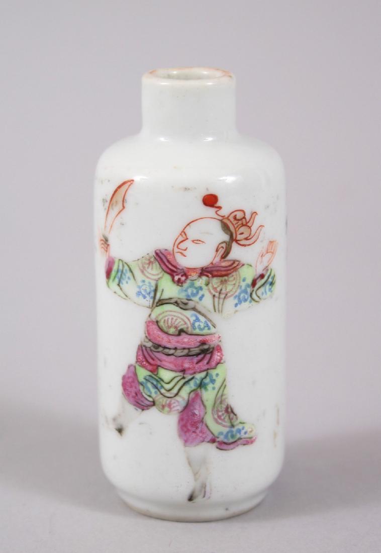 A 19TH CENTURY CHINESE FAMILLE ROSE PORCELAIN SNUFF: A 19TH CENTURY CHINESE FAMILLE ROSE PORCELAIN SNUFF BOTTLE, with a warrior, the reverse with chinese scripture and a sinature, the base bearing four character daoguang mark. 7.2cm high x 3cm wide.