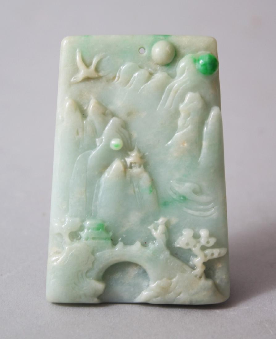 A CHINESE CARVED JADEITE TABLET / PENDANT OF LANDSCAPE: A CHINESE CARVED JADEITE TABLET / PENDANT OF LANDSCAPE SCENE, 7cm high x 4.5cm wide.