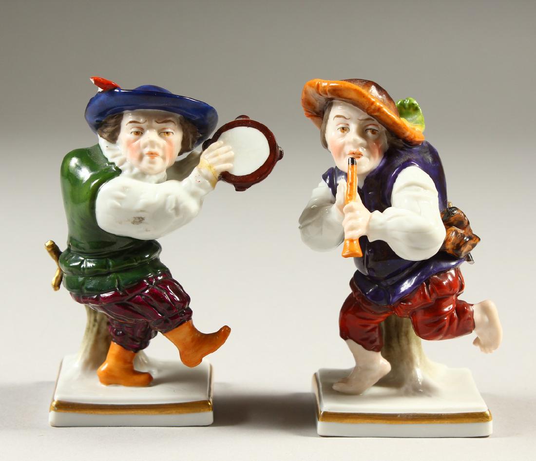 A SMALL PAIR OF CAPODIMONTE FIGURES OF DWARFS, playing: A SMALL PAIR OF CAPODIMONTE FIGURES OF DWARFS, playing musical instruments. 11cms high.