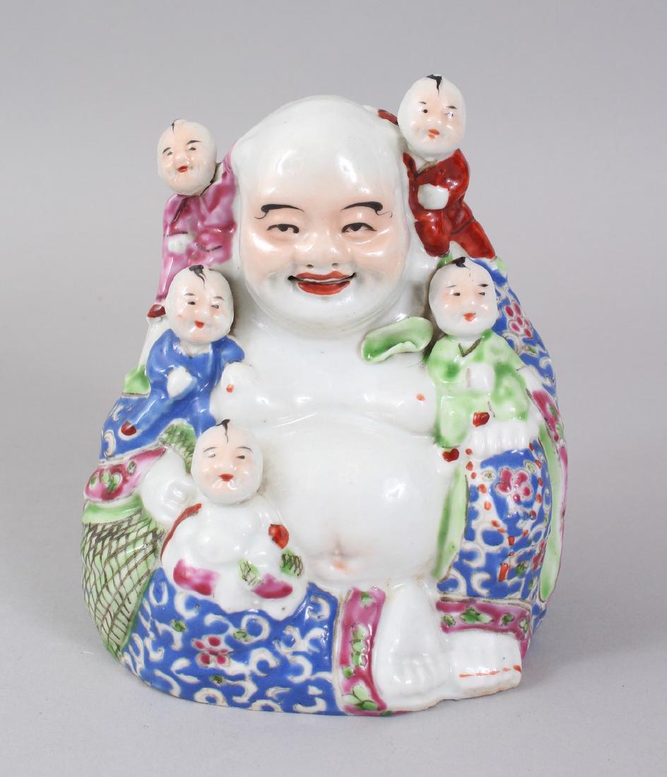 AN EARLY 20TH CENTURY CHINESE FAMILLE ROSE REPUBLIC: AN EARLY 20TH CENTURY CHINESE FAMILLE ROSE REPUBLIC BUDDHA. 15cms high.