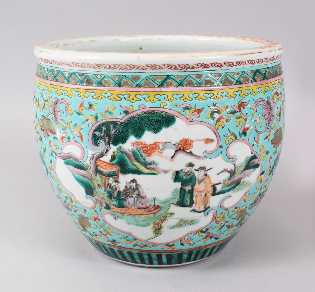 A 19TH CENTURY CHINESE FAMILLE ROSE-VERTE JARDINIERE,: A 19TH CENTURY CHINESE FAMILLE ROSE-VERTE JARDINIERE, the interior painted with fish. 23cms diameter.