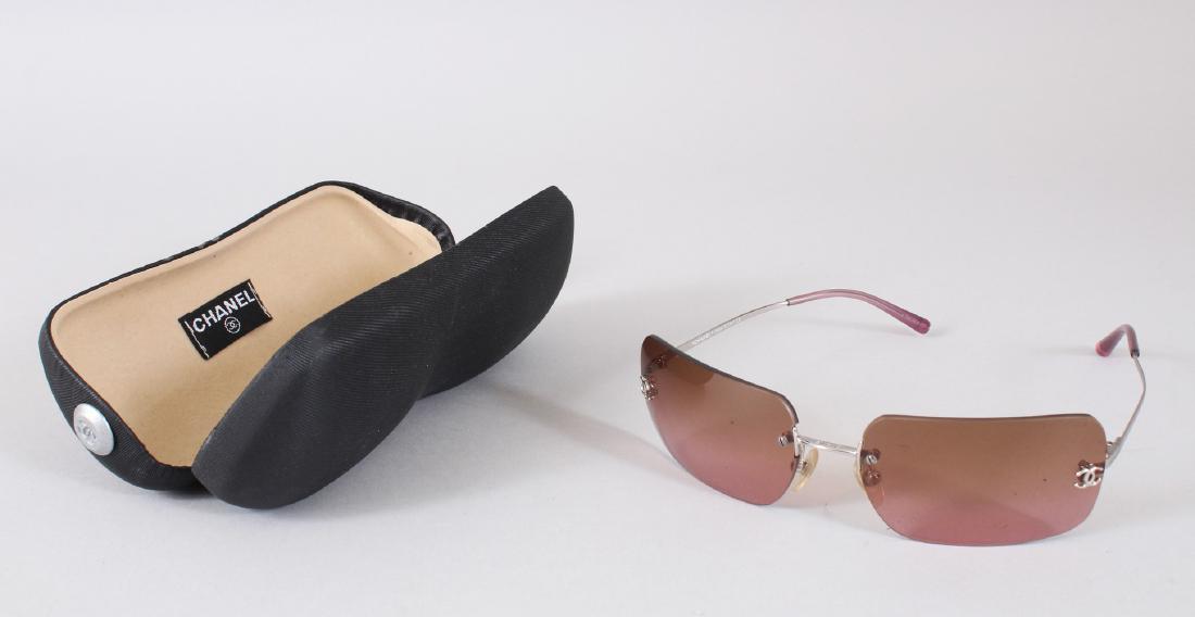 A PAIR OF CHANEL SUNGLASSES, No. 62017, in original: A PAIR OF CHANEL SUNGLASSES, No. 62017, in original box.