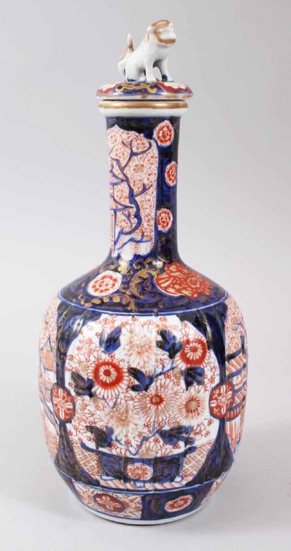 A JAPANESE MEIJI PERIOD FLUTED PORCELAIN IMARI BOTTLE (1 of 7)