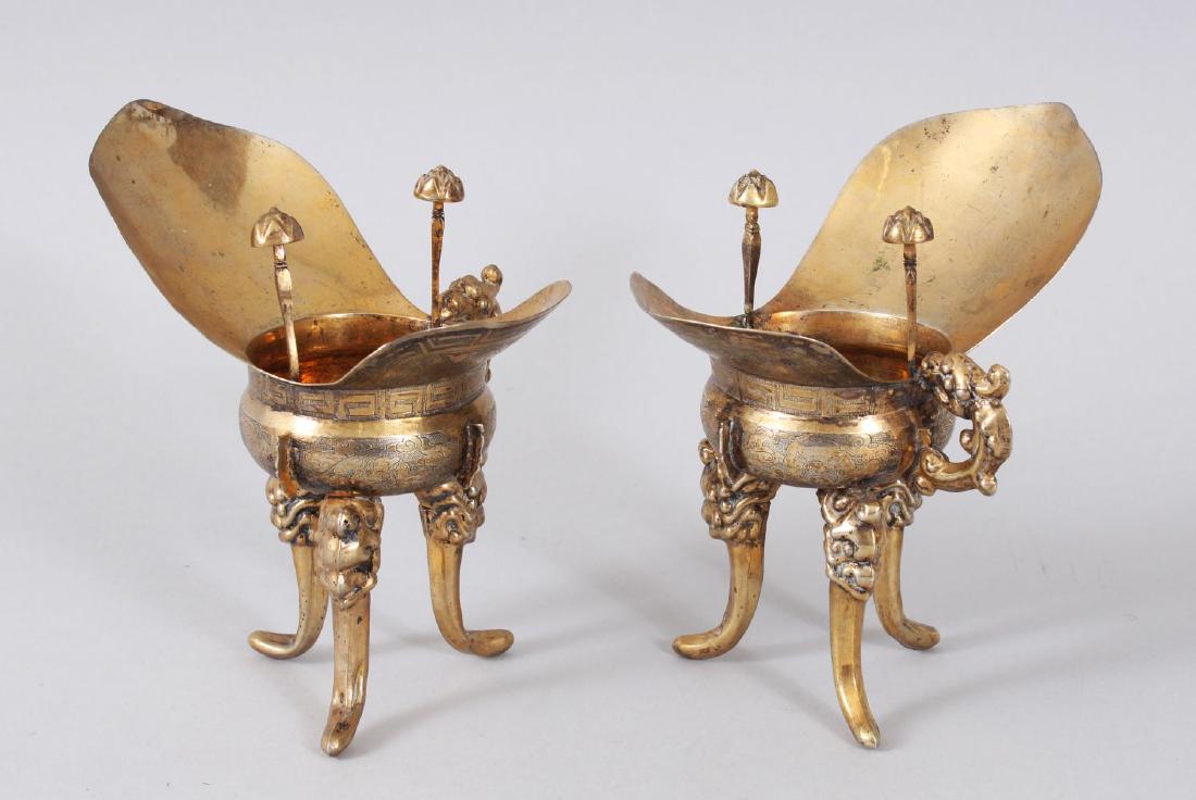 A PAIR OF 19TH CENTURY CHINESE SILVER GILT LIBATION (1 of 6)