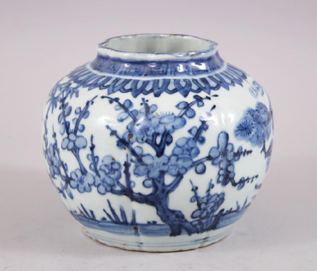 A 19TH CENTURY CHINESE MING STYLE BLUE & WHITE: A 19TH CENTURY CHINESE MING STYLE BLUE & WHITE PORCELAIN BAMBOO VASE, the body decorated with scenes of bamboo and foliage, 13.5cm high x 17cm wide.