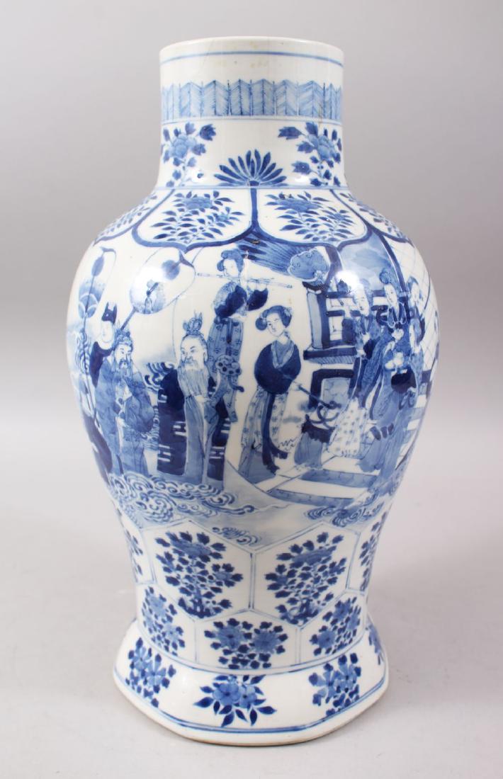 A 19TH CENTURY CHINESE BLUE & WHITE PORCELAIN VASE, the: A 19TH CENTURY CHINESE BLUE & WHITE PORCELAIN VASE, the body decorated with scenes of figures stood within landscape settings, with lower gridded floral decoration, the base bearing six character kang