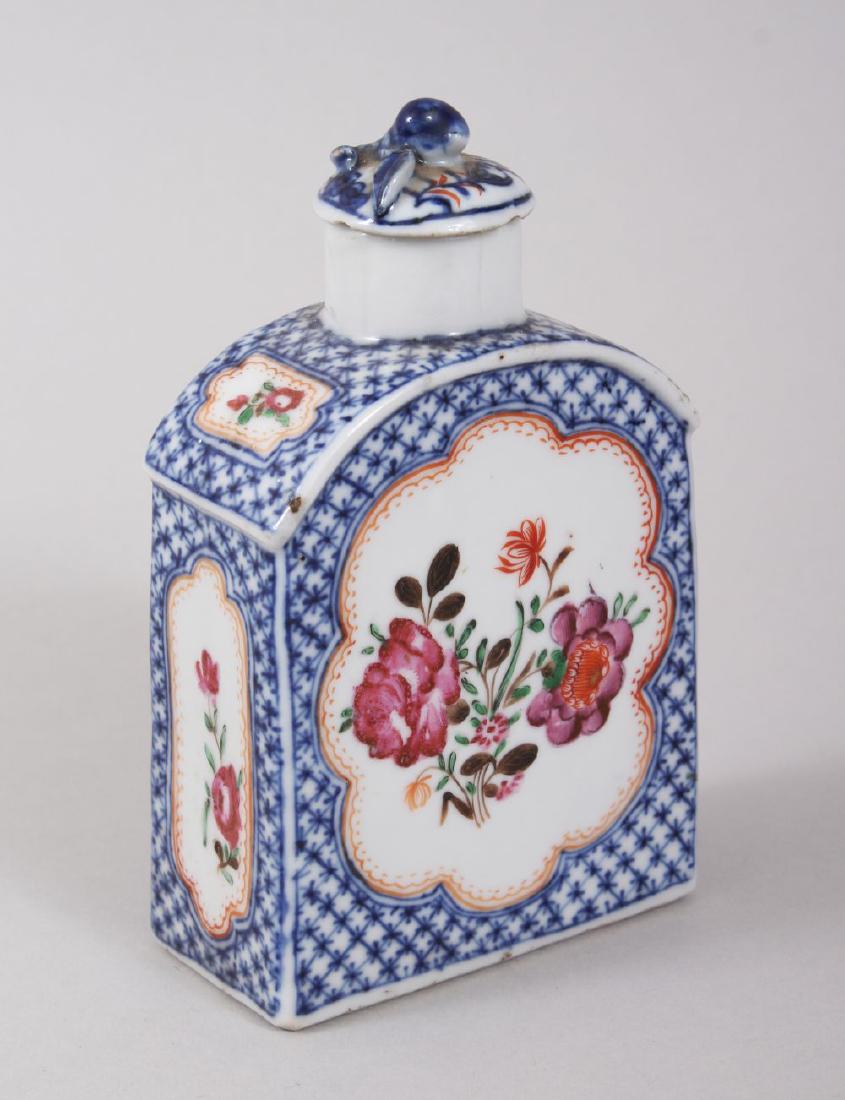 AN 18TH / 19TH CENTURY CHINESE BLUE & WHITE FAMILLE: AN 18TH / 19TH CENTURY CHINESE BLUE & WHITE FAMILLE ROSE PORCELAIN TEA CADDY, decorated with hatched foliage with panels of native flora, the cover with moulded fruit, 13cm high x 8.3cm wide.