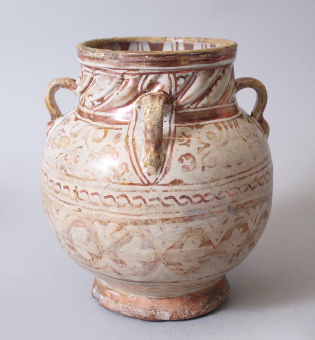 A 16TH CENTURY HISPANO MORESQUE POTTERY FOUR HANDLED (1 of 4)