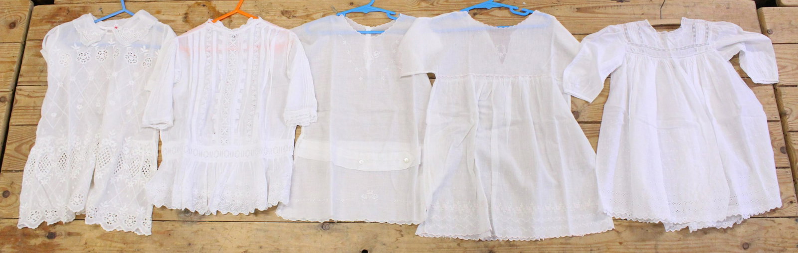 FIVE CHILD'S EDWARDIAN/VICTORIAN COTTON DRESSES/TOPS,: FIVE CHILD'S EDWARDIAN/VICTORIAN COTTON DRESSES/TOPS, some with lace embellishments.