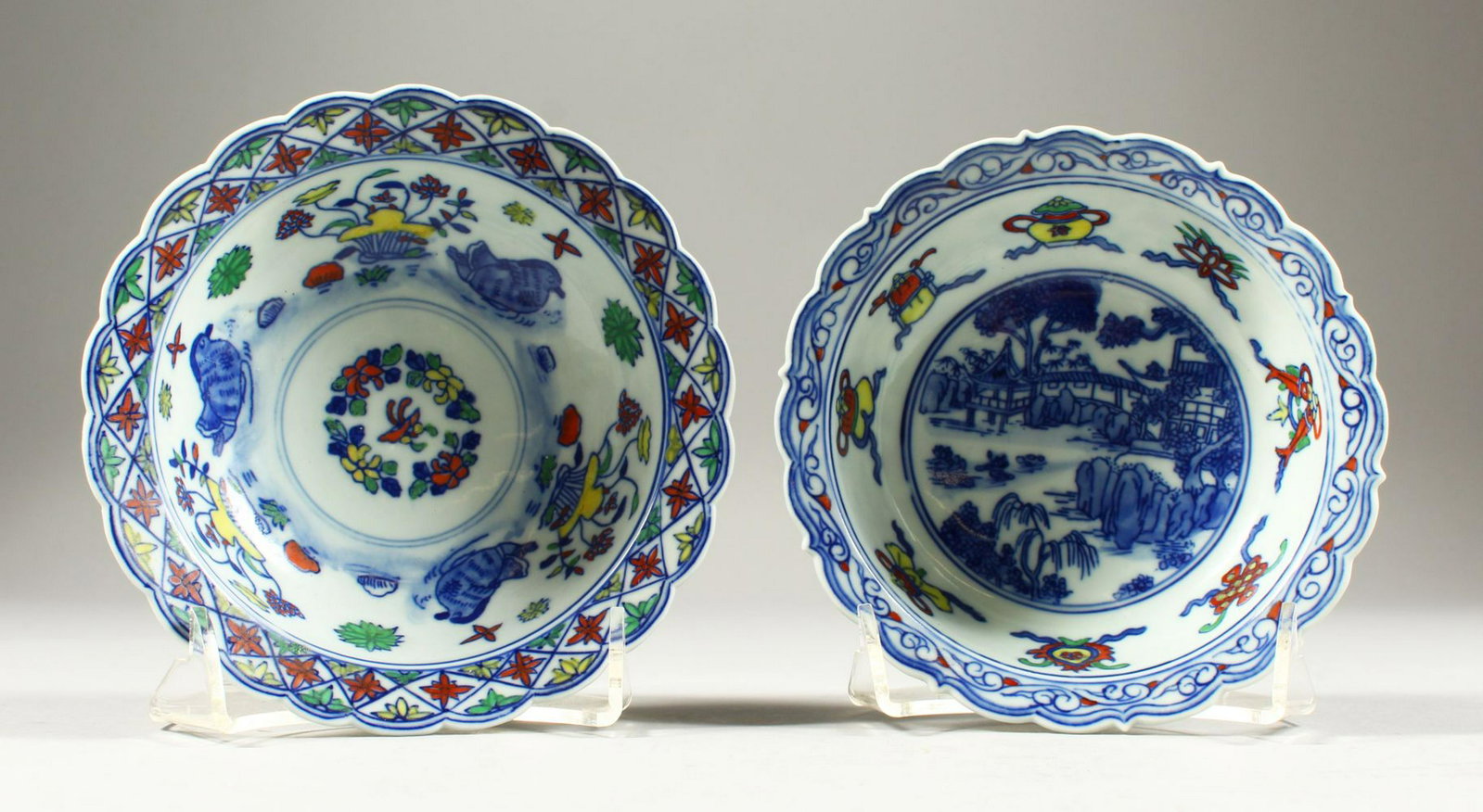 TWO CHINESE CIRCULAR COLUMN BLUE AND WHITE BOWLS with: TWO CHINESE CIRCULAR COLUMN BLUE AND WHITE BOWLS with six character mark. 5ins diameter.