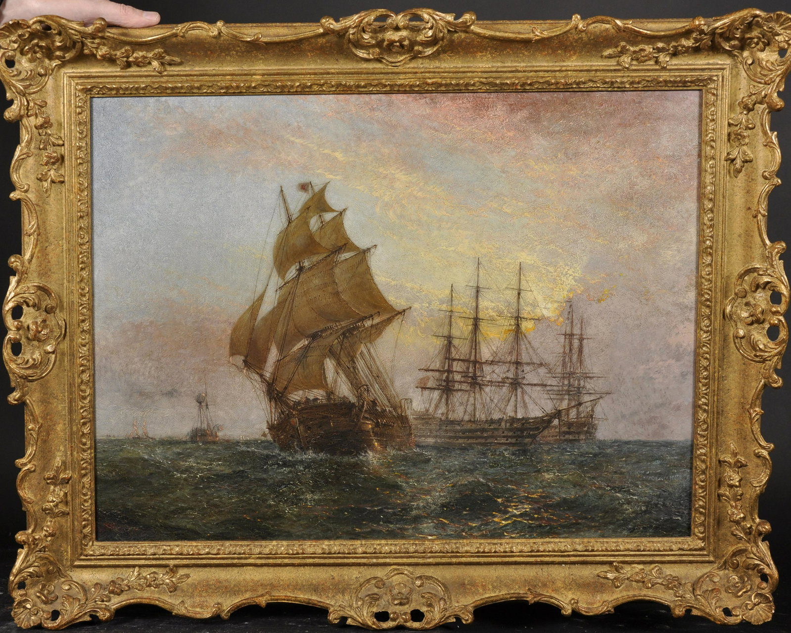 Claude T. Stanfield Moore (1853-1901) British. 'Passing: Claude T. Stanfield Moore (1853-1901) British. 'Passing the Nore Light', with Three Masted Sailing Boats in Choppy Waters, Oil on Canvas, Signed and Indistinctly Dated '87, 18" x 24".