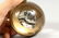 A NOVELTY BALL SHAPED DESK CLOCK. 3ins diameter. - 4