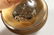 A NOVELTY BALL SHAPED DESK CLOCK. 3ins diameter. - 6