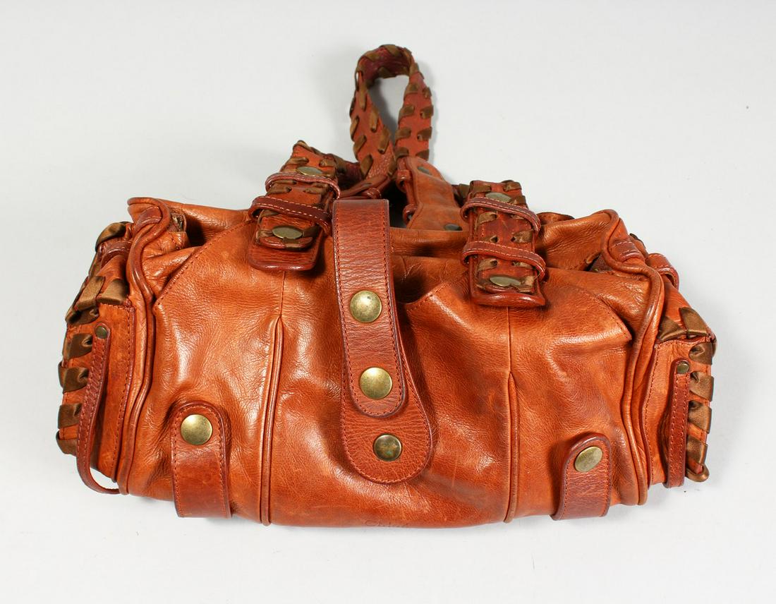 A CHLOE LEATHER BAG, in a Chloe bag.: A CHLOE LEATHER BAG, in a Chloe bag.