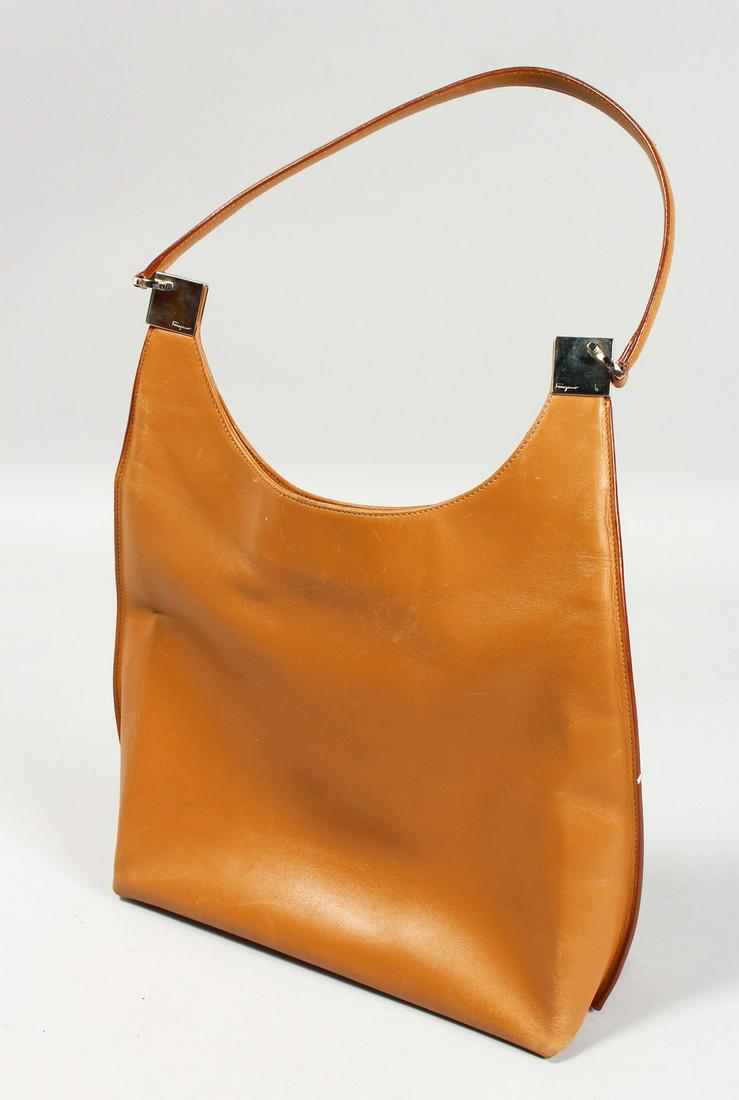 A SALVATORE FERRAGAMO BROWN LEATHER HANDBAG.: A SALVATORE FERRAGAMO BROWN LEATHER HANDBAG.