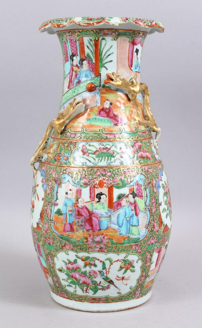 A GOOD 19TH CENTURY CHINESE CANTON FAMILLE ROSE: A GOOD 19TH CENTURY CHINESE CANTON FAMILLE ROSE PORCELAIN VASE, with various dragon enclosed panels depicting figures interior and birds amongst native flora, further decorated with formal scrolling f
