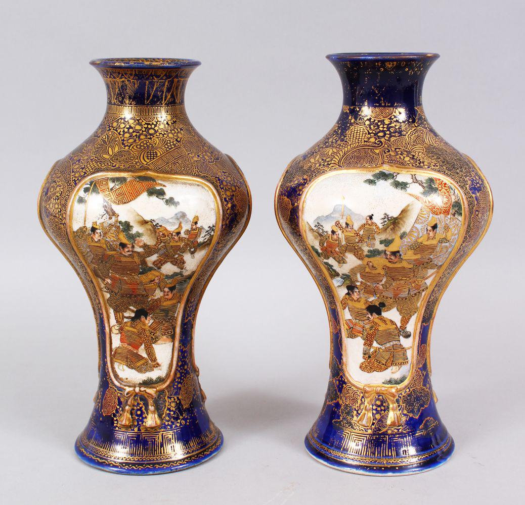 A GOOD PAIR OF JAPANESE MEIJI PERIOD SATSUMA VASES,: A GOOD PAIR OF JAPANESE MEIJI PERIOD SATSUMA VASES, decorated upon a blue ground with two moulded panels depicting scenes o warriors in battle and the verso of geisha girls, blue ground decorated fine