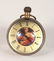 A NOVELTY BALL SHAPED DESK CLOCK, with portrait bust.