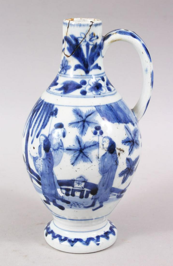 A TRANSITIONAL 16TH CENTURY CHINESE BLUE & WHITE: A TRANSITIONAL 16TH CENTURY CHINESE BLUE & WHITE PORCELAIN EWER, decorated with scenes of figures in landscapes, 20cm high x 10cm wide.