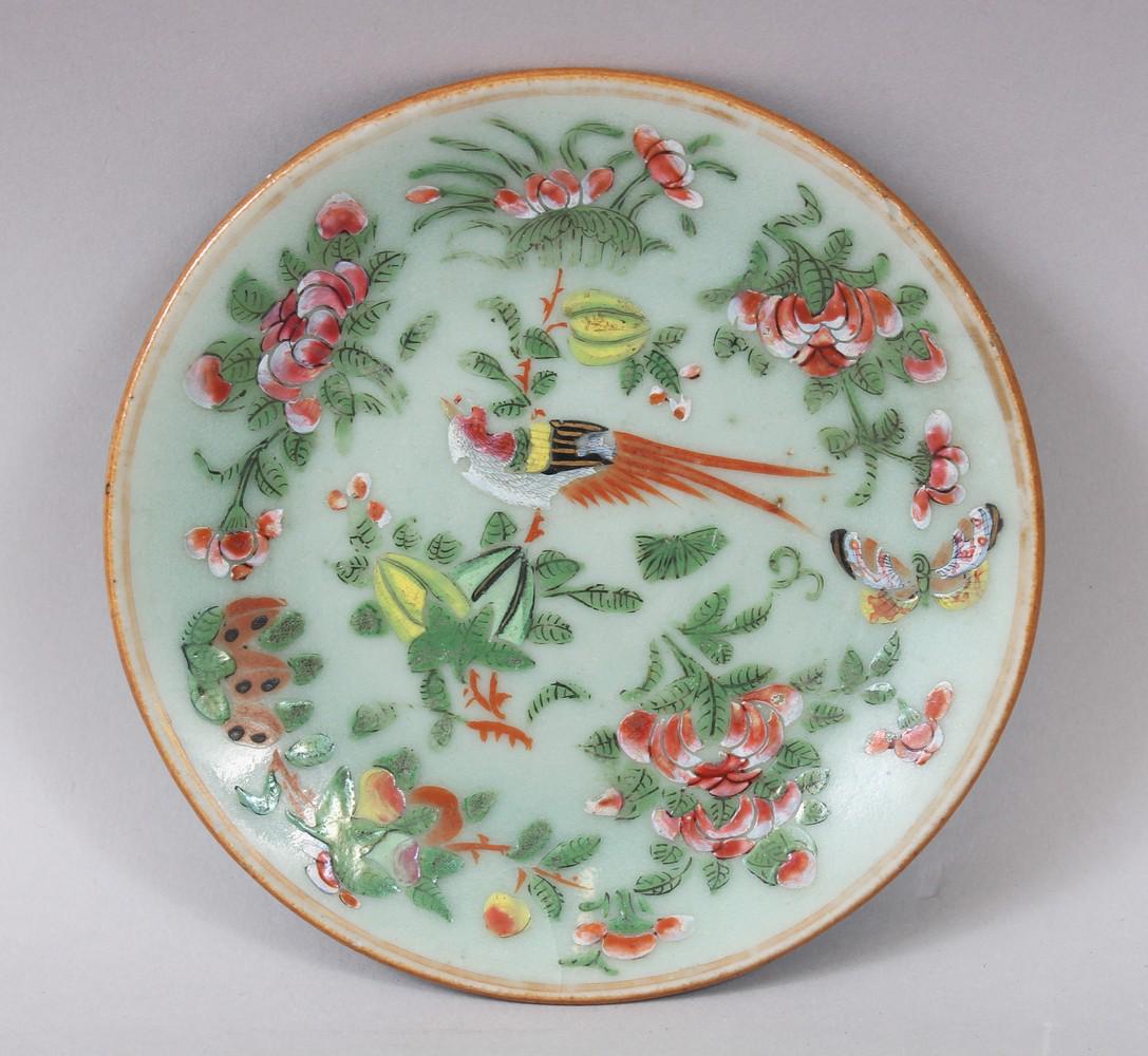 A 19TH CENTURY CHINESE CELADON FAMILLE ROSE PORCELAIN: A 19TH CENTURY CHINESE CELADON FAMILLE ROSE PORCELAIN DISH, the dish decorated with flora and birds, the base with a seal mark, 15cm diameter