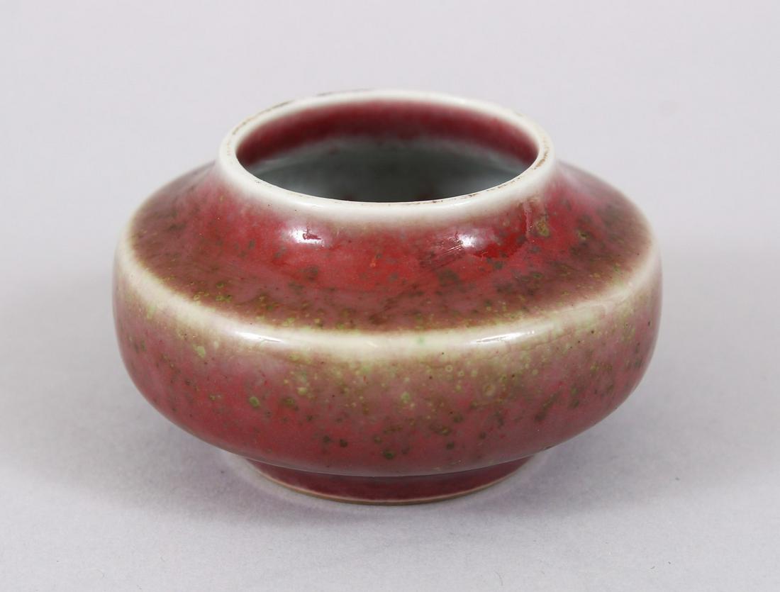 A GOOD CHINESE KANGXI STYLE SANG DE BOEUF PORCELAIN: A GOOD CHINESE KANGXI STYLE SANG DE BOEUF PORCELAIN BRUSH WASHER, the base with a six-character Kangxi mark, 7cm diameter x 3.5cm high.